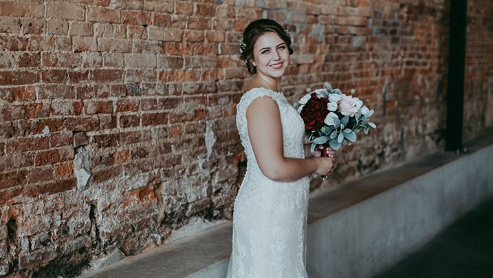 Sweet Bride Wears Enchanting by Mon Cheri for her June Wedding Desktop Image